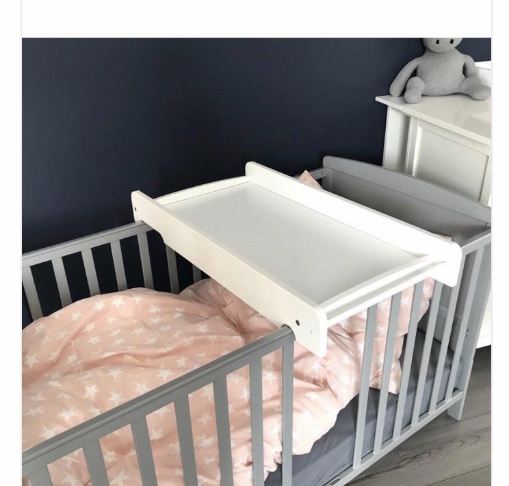 changing table on top of crib